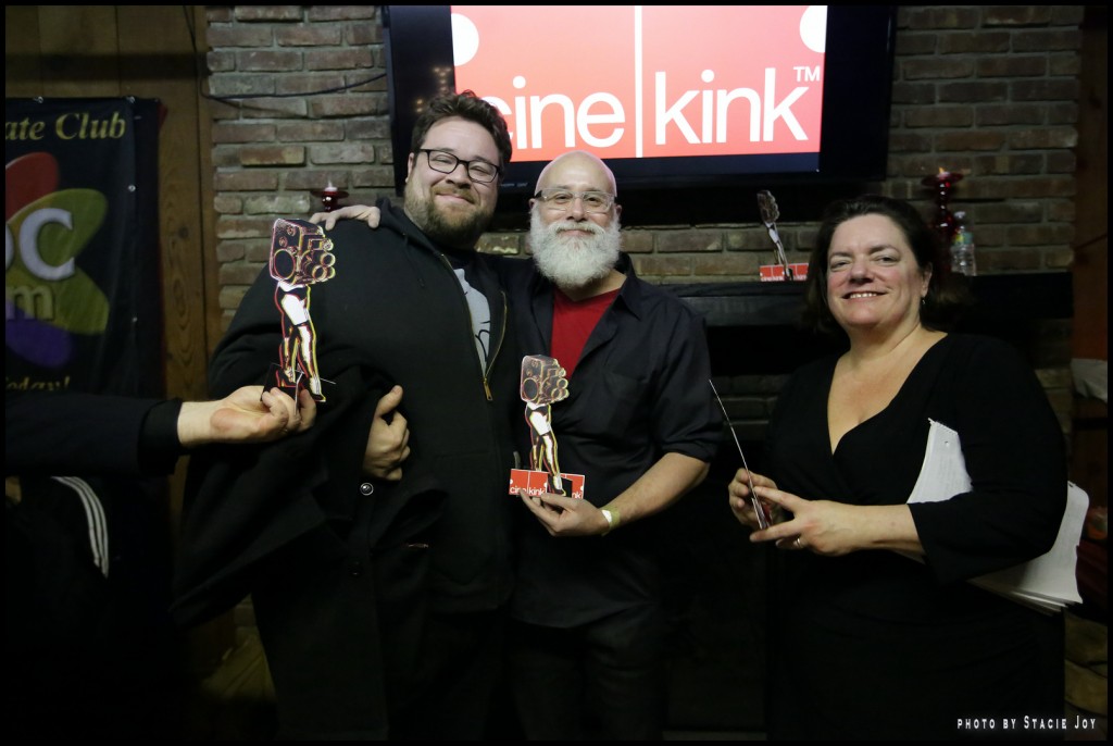The Red Umbrella Diaries David Kornfield and Chris Fiore accept an award from CineKink's Lisa Vandever